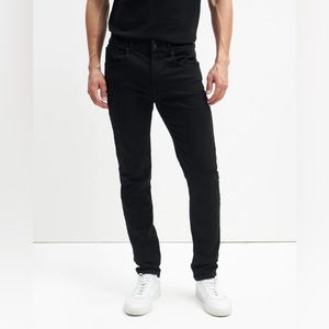 LUXE PERFORMANCE PLUS SLIMMY TAPERED IN MID-BLUE